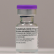 A vial of the Pfizer-BioNTech Covid-19 vaccine is seen at a vaccination health center in Cardiff, South Wales in the UK on December 8, 2020